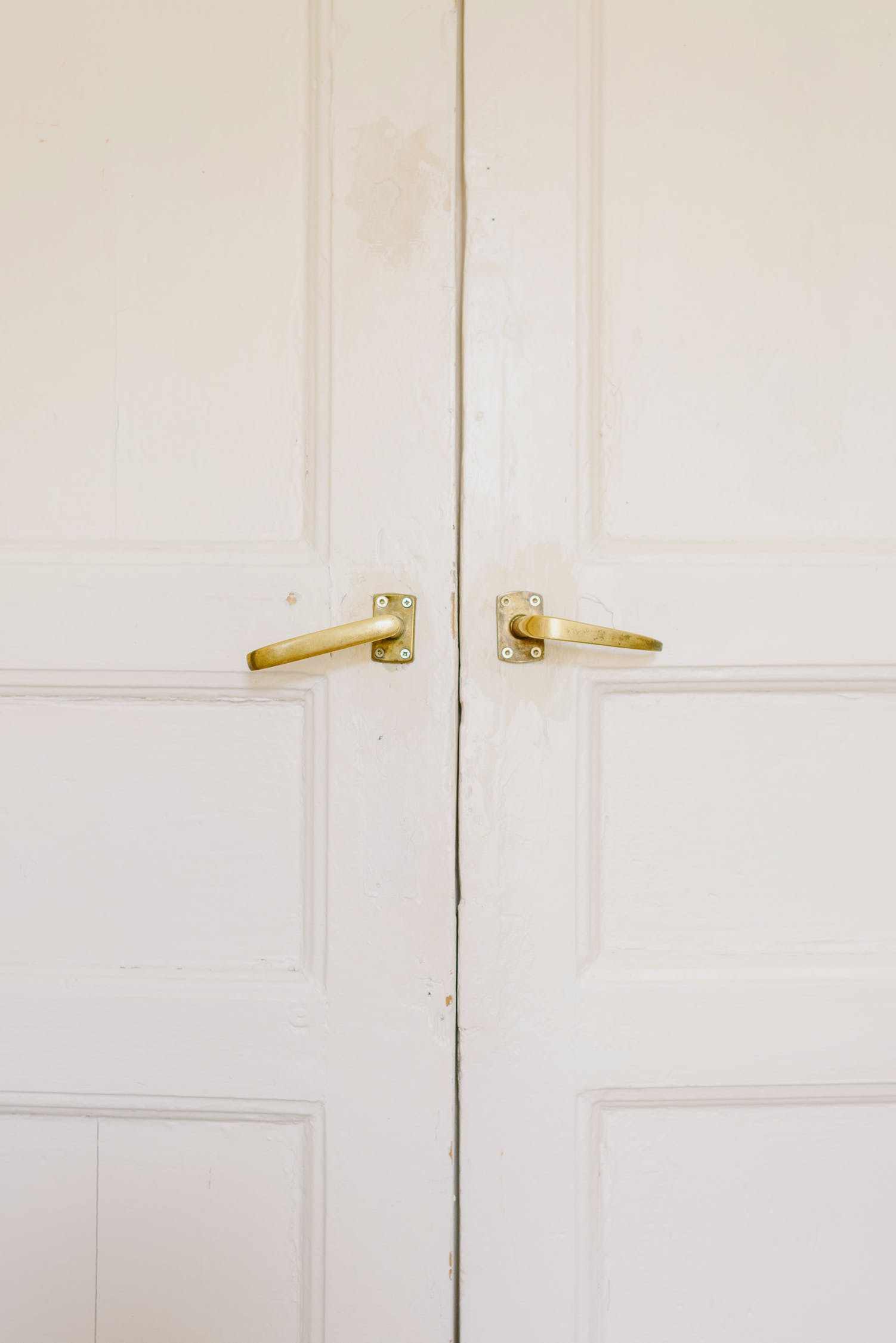 white doors with golden handles