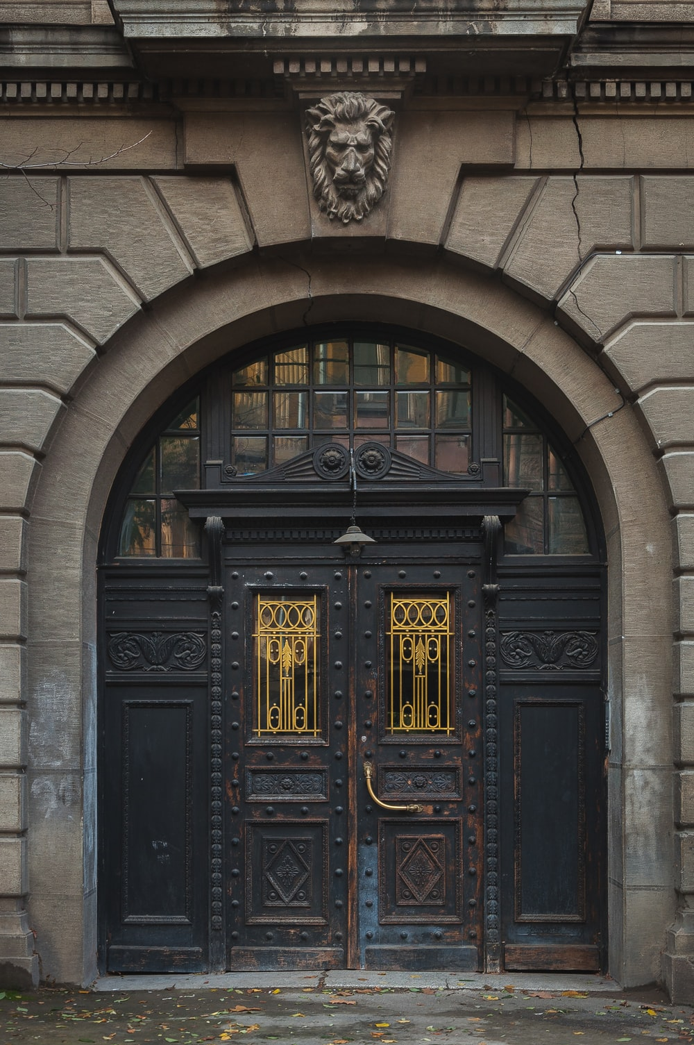 A steel door under an archway