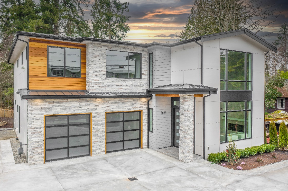 A picture of aluminum and glass garage doors