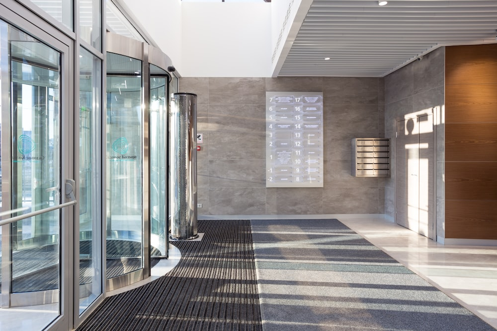 A modern office building with automatic doors