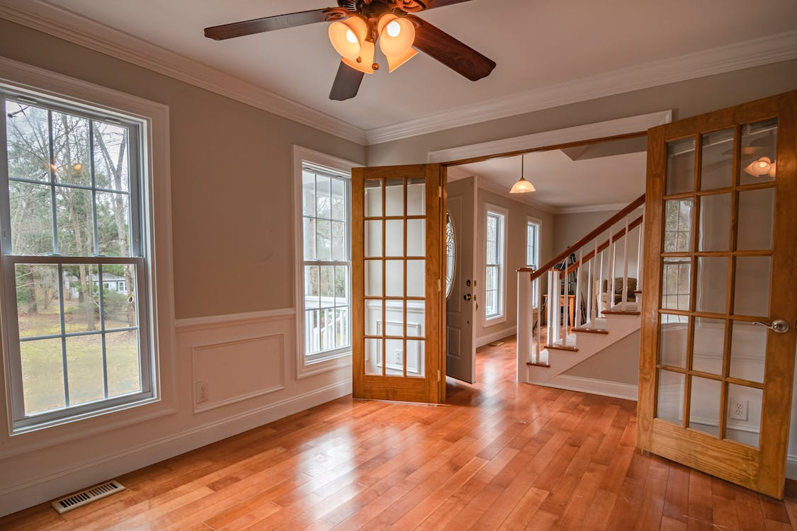 a brown framed glass door