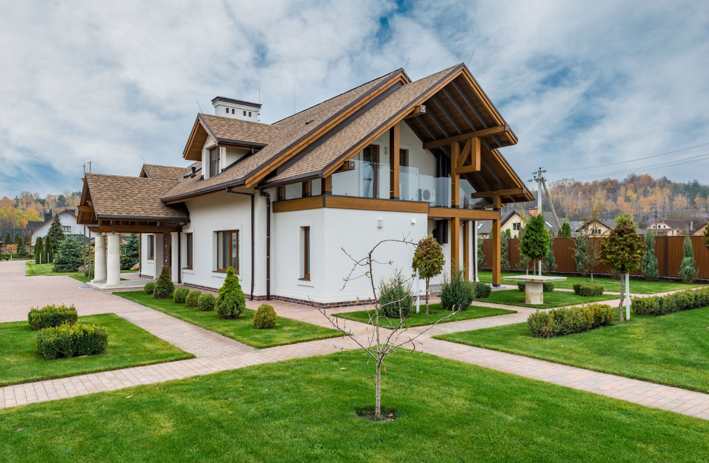 White and Brown Residential Villa with Trees
