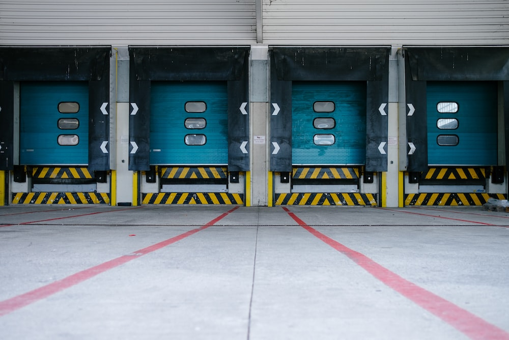 Multiple dock levelers at a warehouse