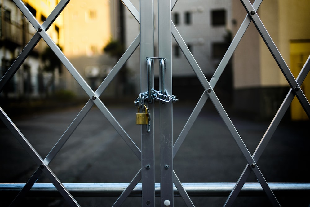 A padlocked scissor gate