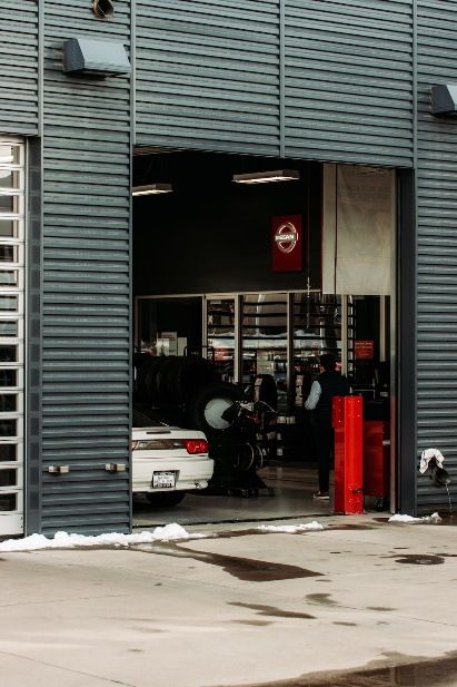 An auto shop with a rolling service door