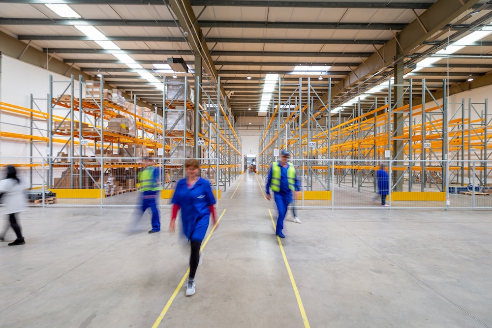 Workers moving inside a commercial facility