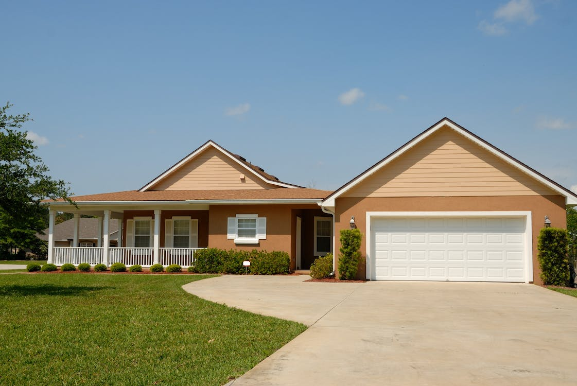 A house with a white garage door