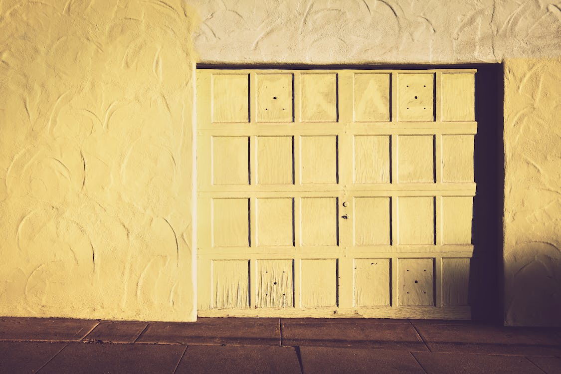 A wooden residential garage door