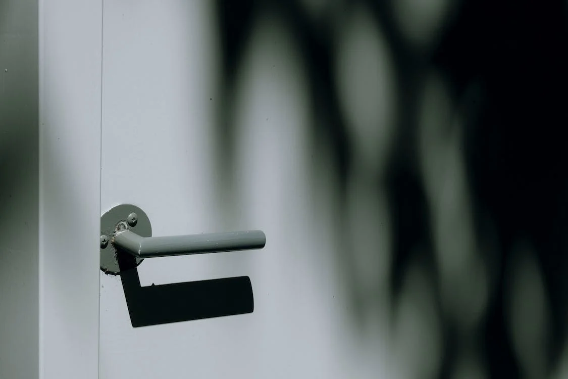 The handle on a man door in Toledo