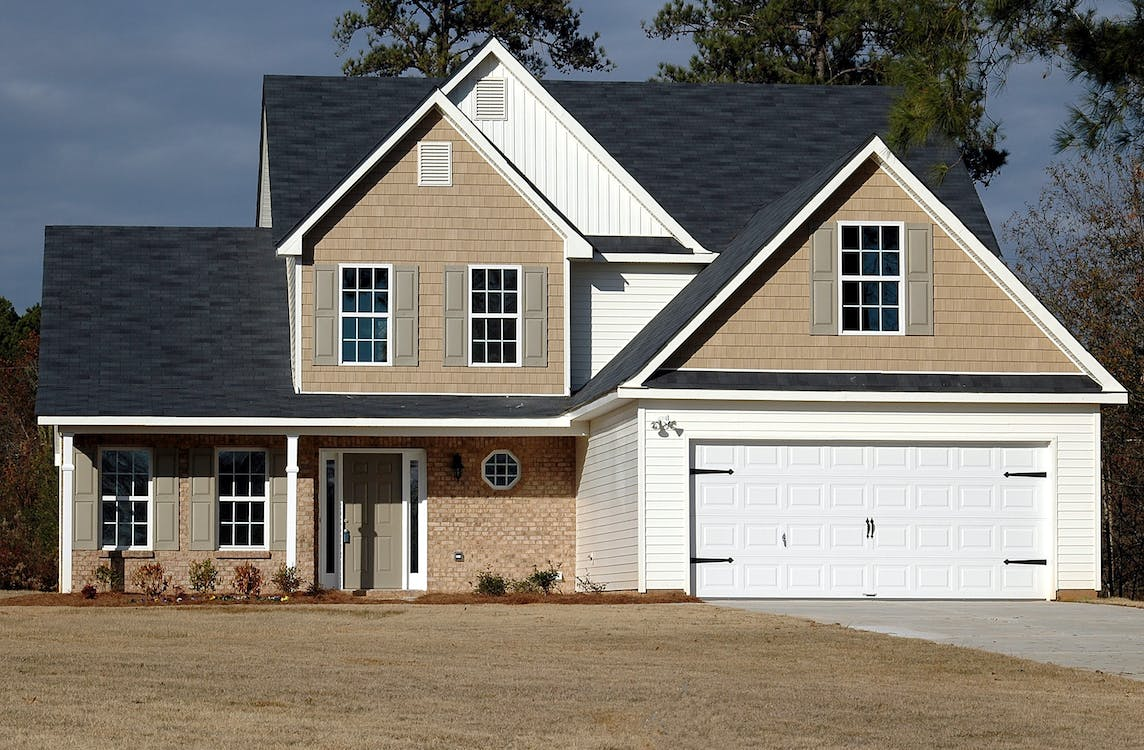 A house with a white garage door